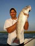 Nice Redfish!!! ZZZZZZZZZZ!!! Now the Winter fishing is ON in The Marsh and Bayous!!! The Birds are still feeding on live Shrimp while the trout run them to the surface!!! That why Live shrimp work the best under a Cajun Thunder Cork!!! Best artificial baits are Sparkled Beetles, just cast them out and let sink about 5 feet under the water then, just give a start and stop action while free line and restive!!! Fish ON!!! 
Even When the water is low and muddy fish along the shore with Dead Shrimp under a Cajun Thunder Cork and you will land some Redfish for the Grill!!! 
This will work all winter long!!! 
Catching Speckled Trout, Redfish and a few Flounder on Live Shrimp just minutes from the Dock!!! Still Working on the 7 New Boat Hoist and working on the Properties!!! The New Deluxe Overnight Accommodations are Available one with a 360 degree view of the Marsh and Bayous!!! Now Lodging to Accommodate up to 30 anglers!!! Multiple Charter Boats Available!!! The Main Dock is Lighted for Night Fishing!!! 
May - November was filled with many Successful Days on the Bayou!!! 
P0101225.jpg